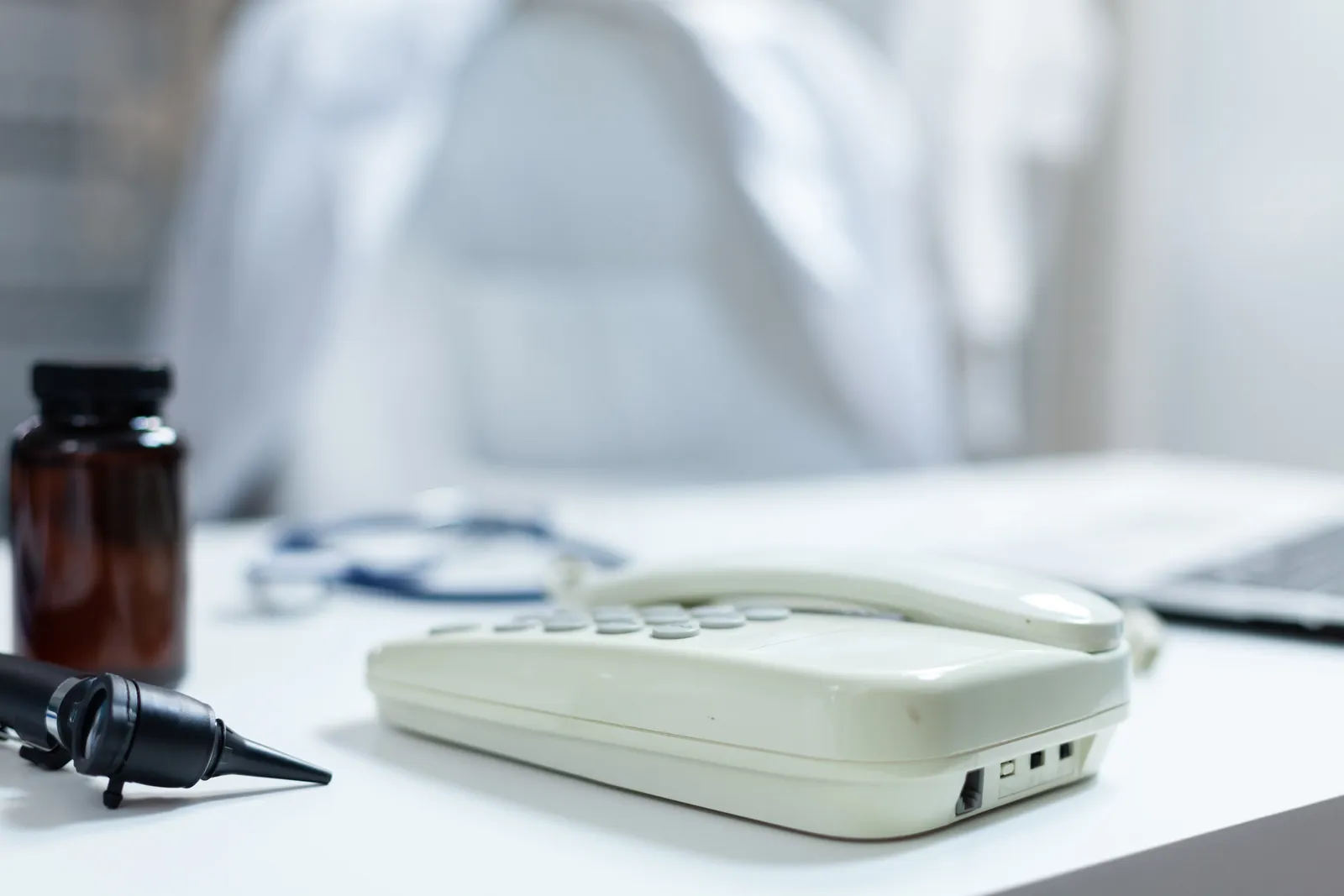 Closeup of medical stethoscope and landine standin utc